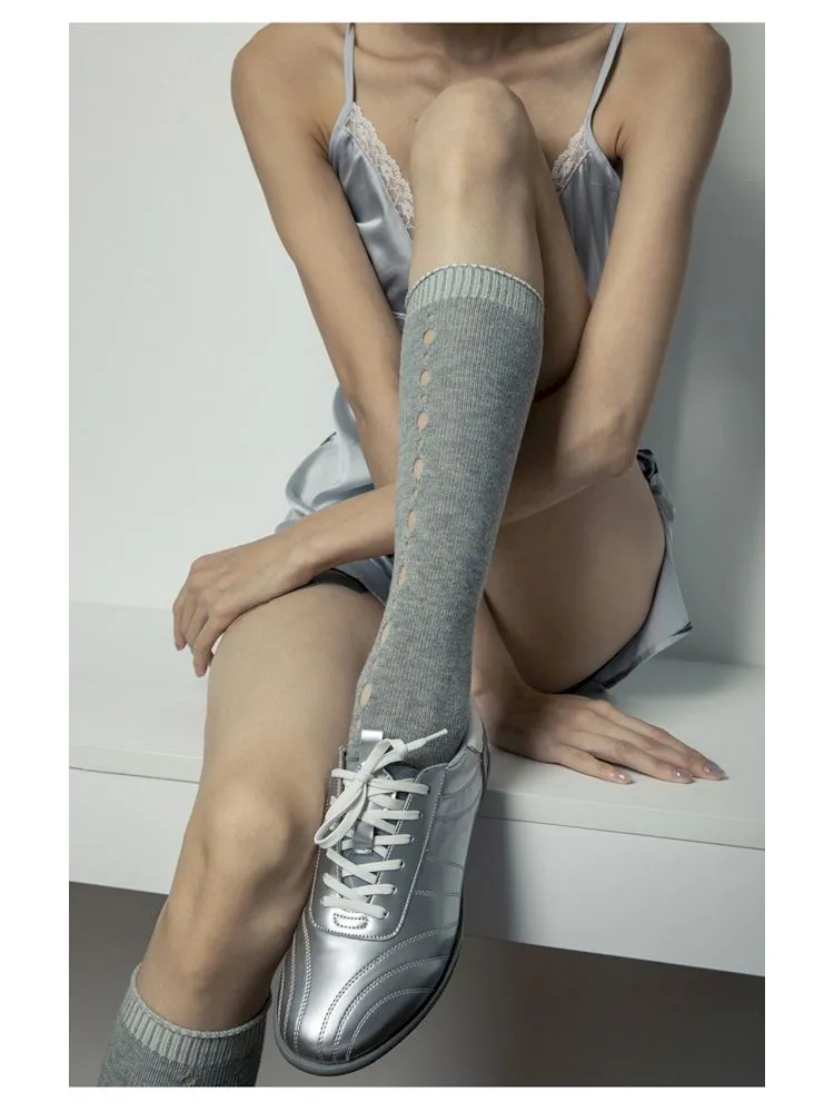 metallic silver lace-up sneakers